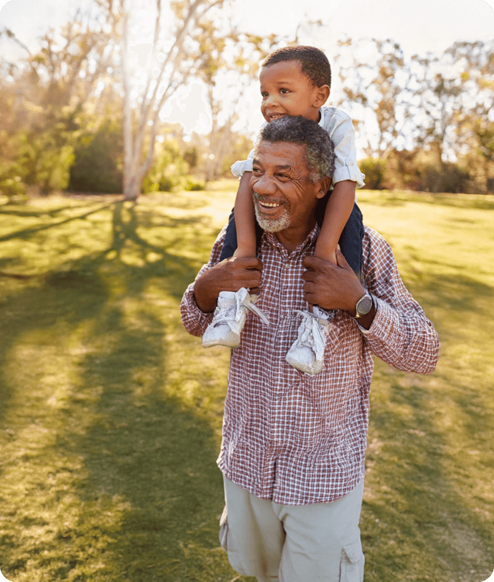 granddad playing outside with grandson